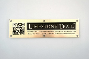 Etched identification plate with company logo and QR code